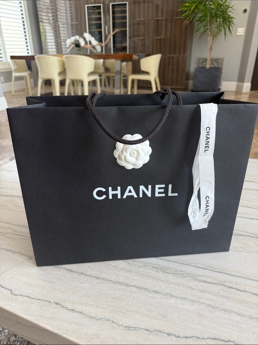 CHANEL Black Shopping Bag with White Camellia and Ribbon